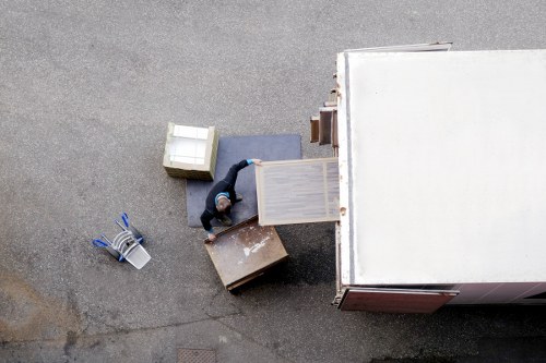 Mover wearing PPE while handling items in Edgware