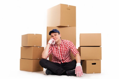 Packed boxes and furniture ready for transport from Edgware property